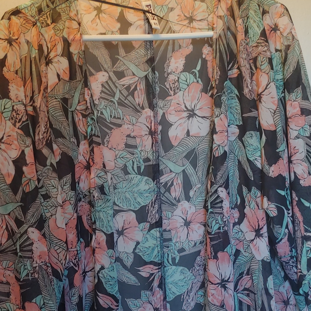 Translucent kimono like jacket over cover